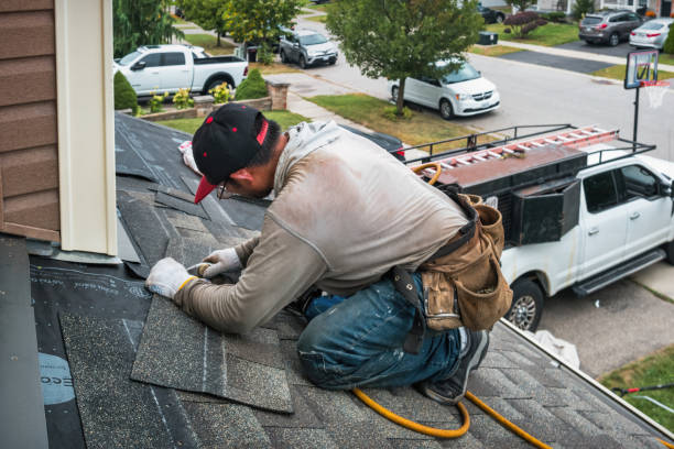 Professional Gutter Repair And Installation technician working in Cambridge, OH